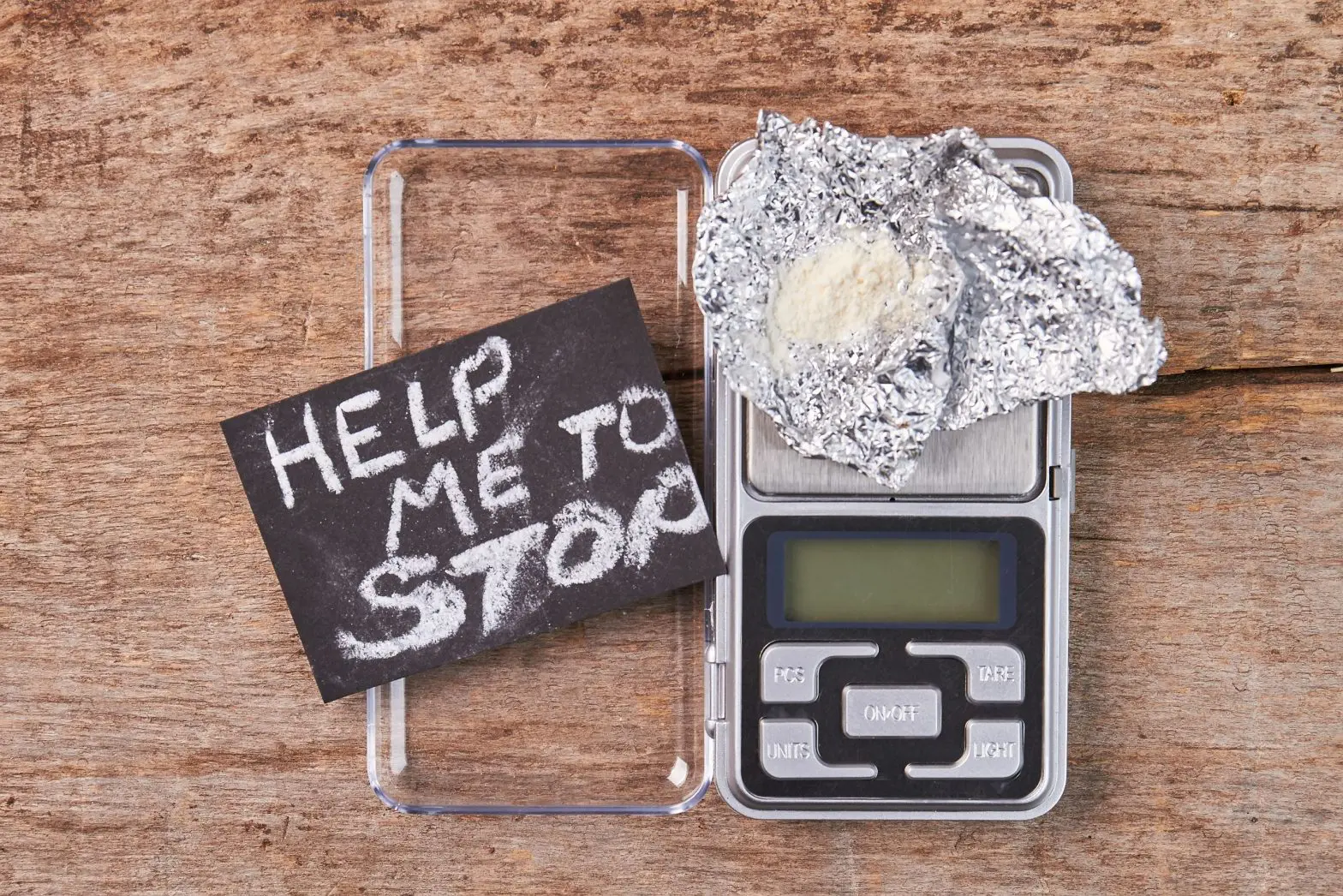 Drugs with a "help me to stop" sign, showing the need for continuity of care